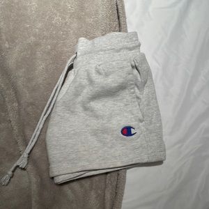 Small, grey, champion sweatpant shorts. Run small